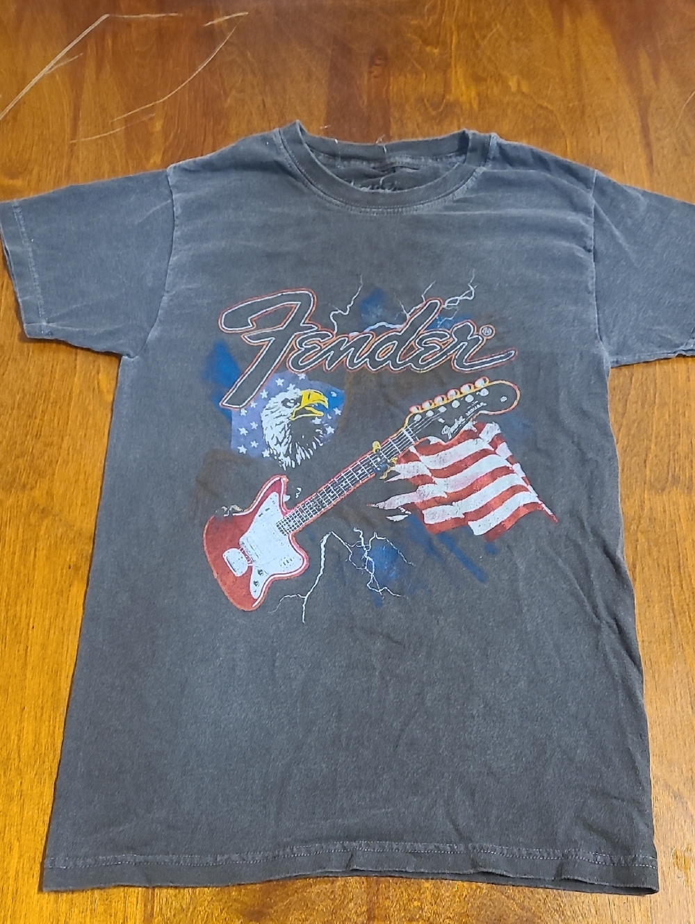 Fender Black Tee with Red Guitar and White Flag Accent